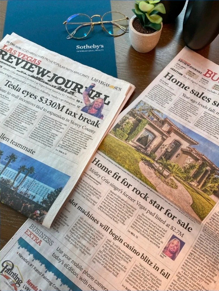 Las Vegas Review-Journal front page and business section on a desk. The business section headline reads: Home fit for rock star for sale, Mötley Crüe singer's former Vegas pad listed at $2.7M.